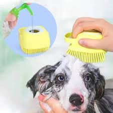 Self-cleaning push-button pet grooming brush